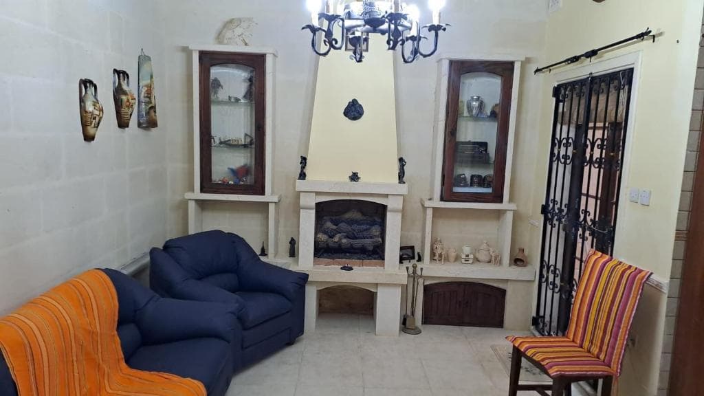 Cozy living room with traditional stone details